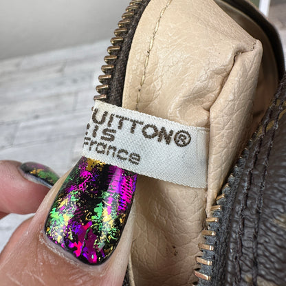 Louis Vuitton Trousse 23
