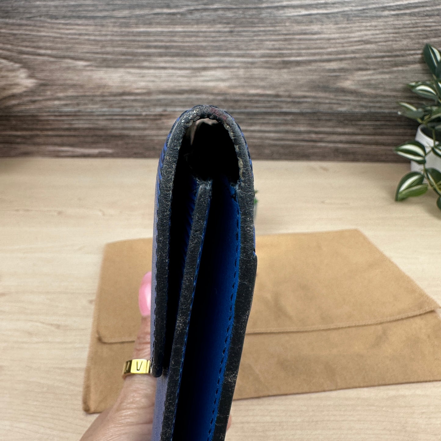 Louis Vuitton Toledo Blue Epi Leather Montaigne Clutch