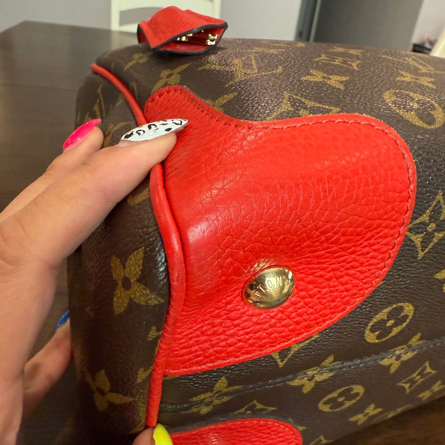 Retiro NM 2-Way Bag in Coquelicot Leather and
Monogram Canvas