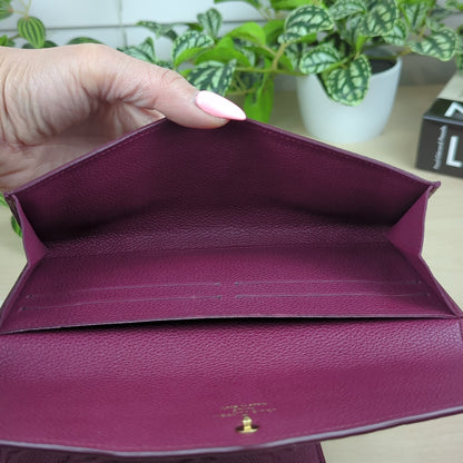 Louis Vuitton Curieuse  Empreinte Leather Wallet Aurore