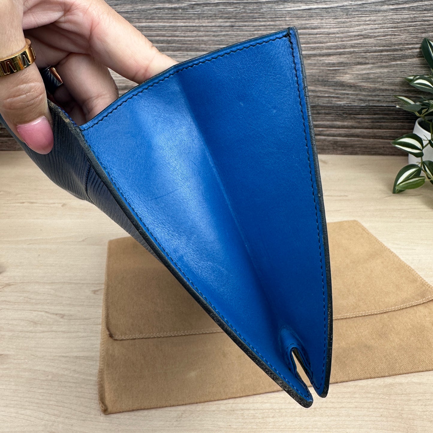 Louis Vuitton Toledo Blue Epi Leather Montaigne Clutch