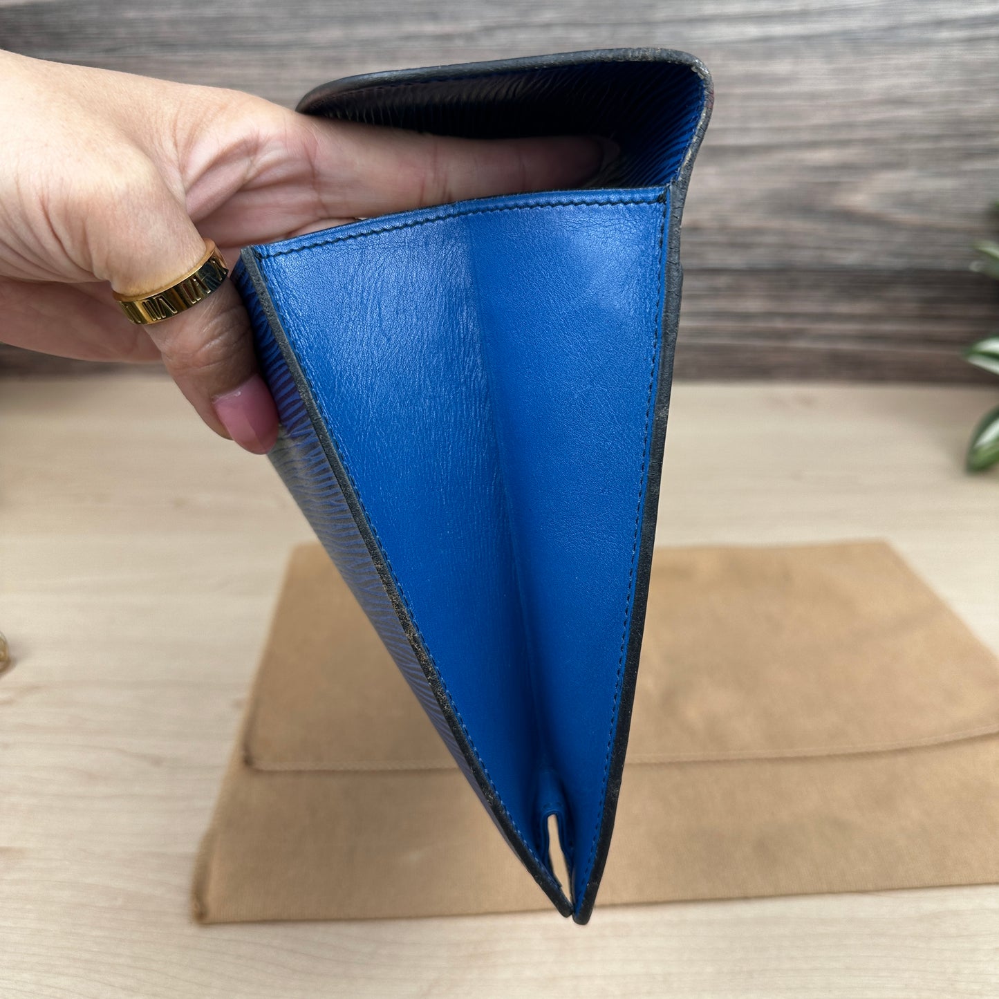 Louis Vuitton Toledo Blue Epi Leather Montaigne Clutch