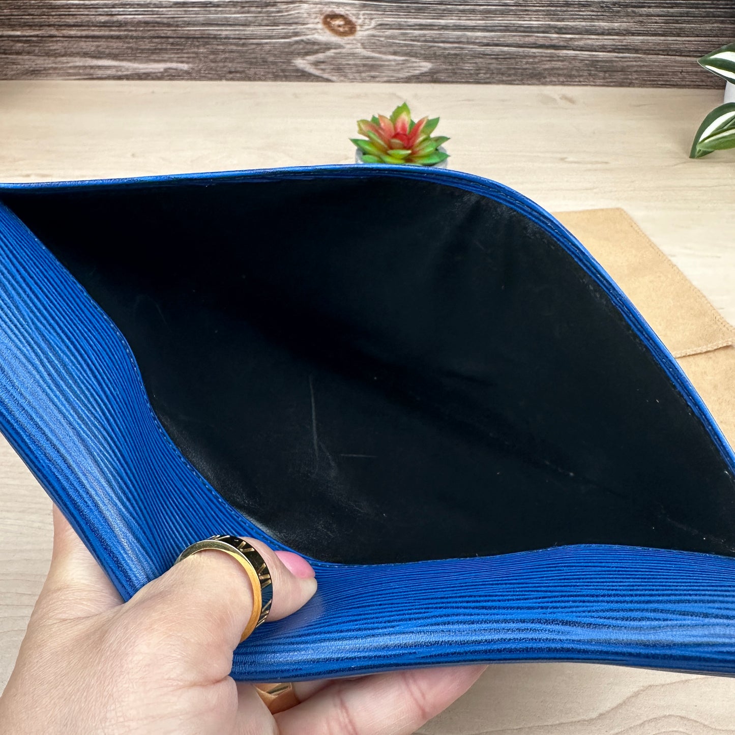 Louis Vuitton Toledo Blue Epi Leather Montaigne Clutch