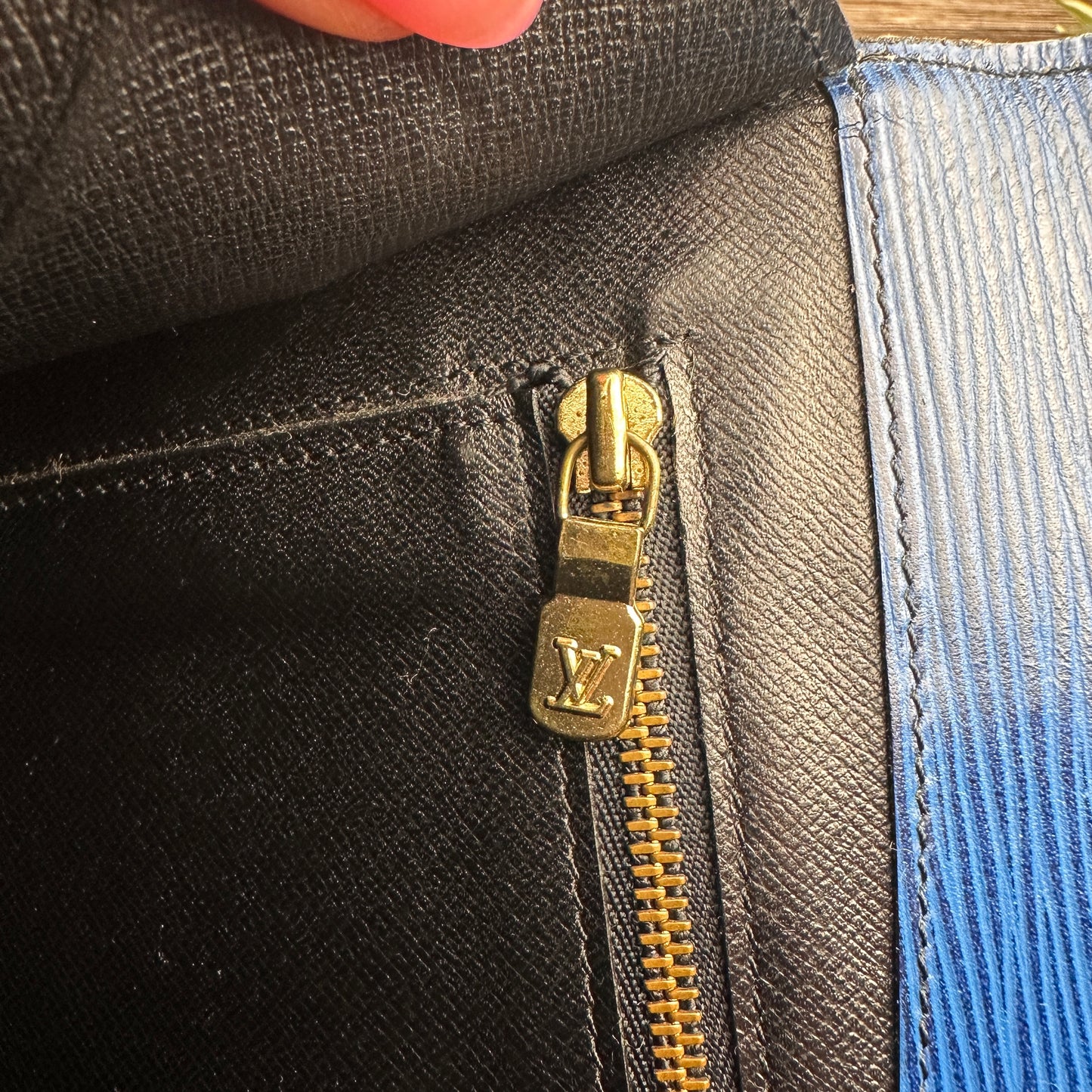 Louis Vuitton Toledo Blue Epi Leather Montaigne Clutch
