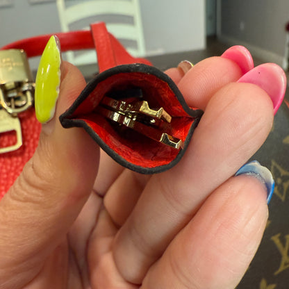 Retiro NM 2-Way Bag in Coquelicot Leather and
Monogram Canvas