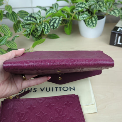 Louis Vuitton Curieuse  Empreinte Leather Wallet Aurore