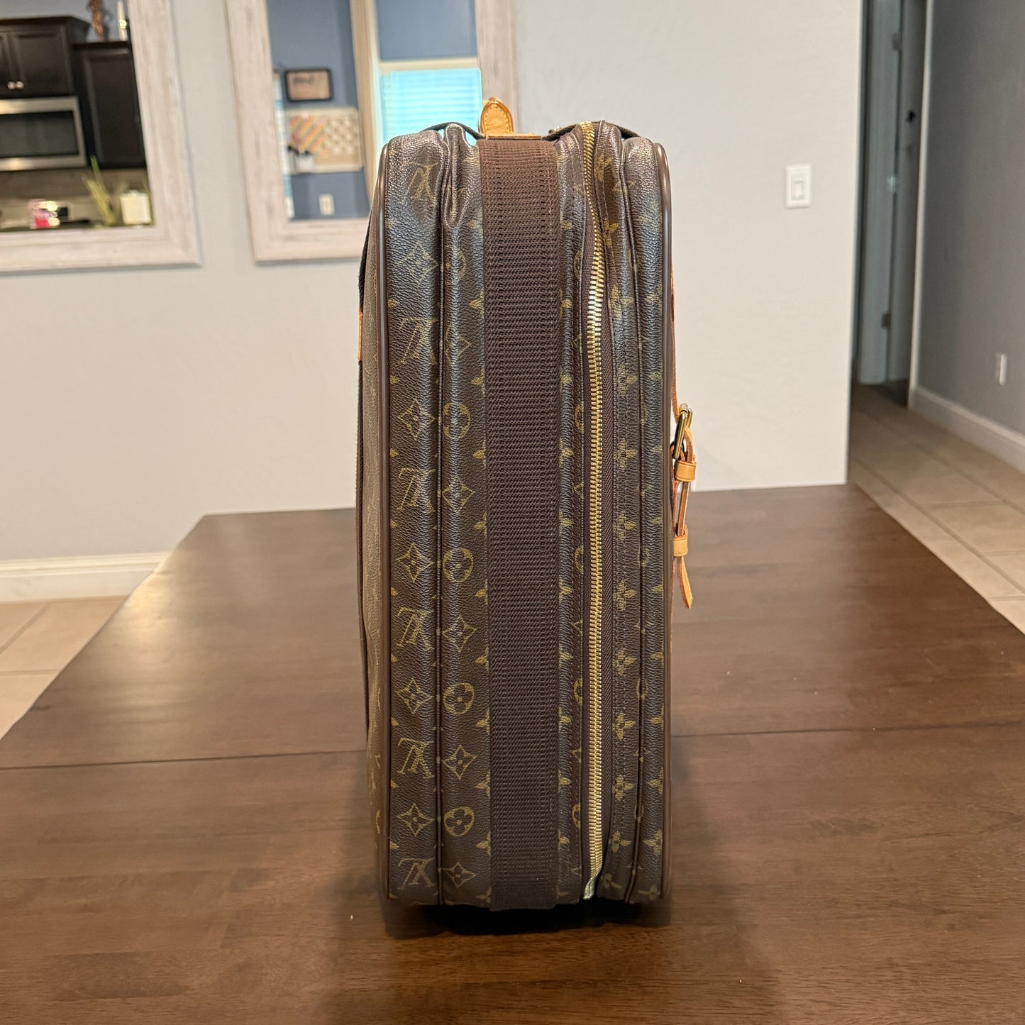 Monogram Satellite 65 Suitcase