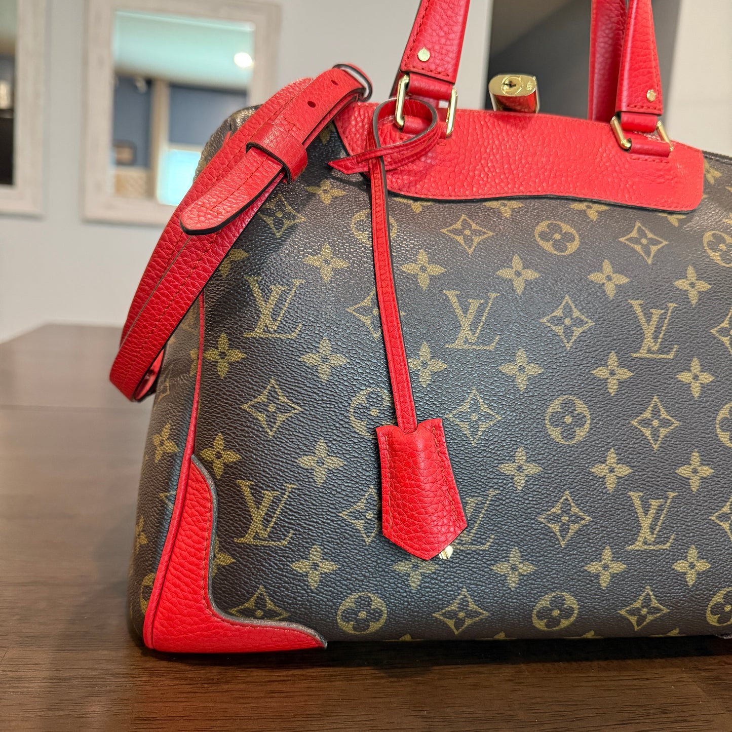 Retiro NM 2-Way Bag in Coquelicot Leather and
Monogram Canvas