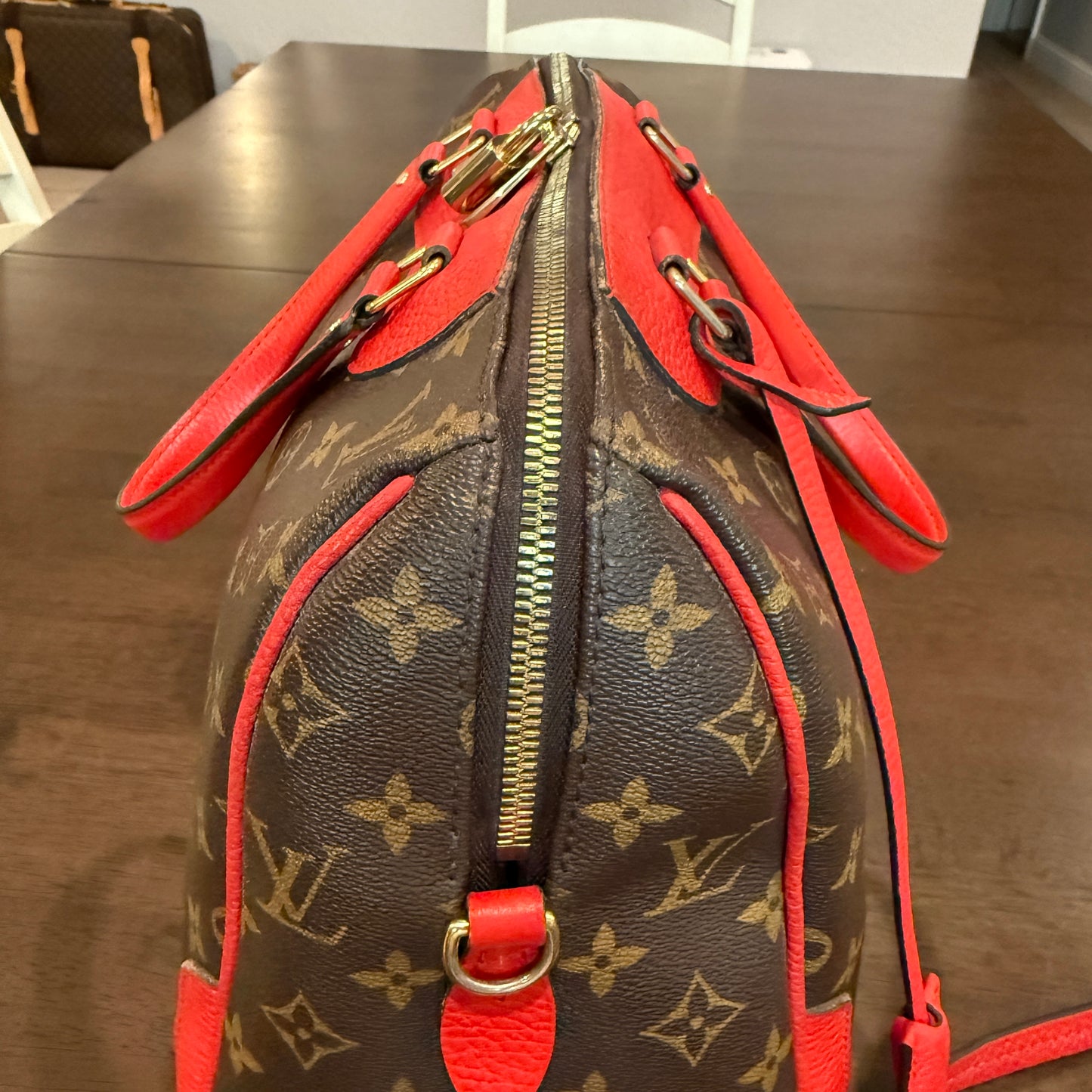 Retiro NM 2-Way Bag in Coquelicot Leather and
Monogram Canvas