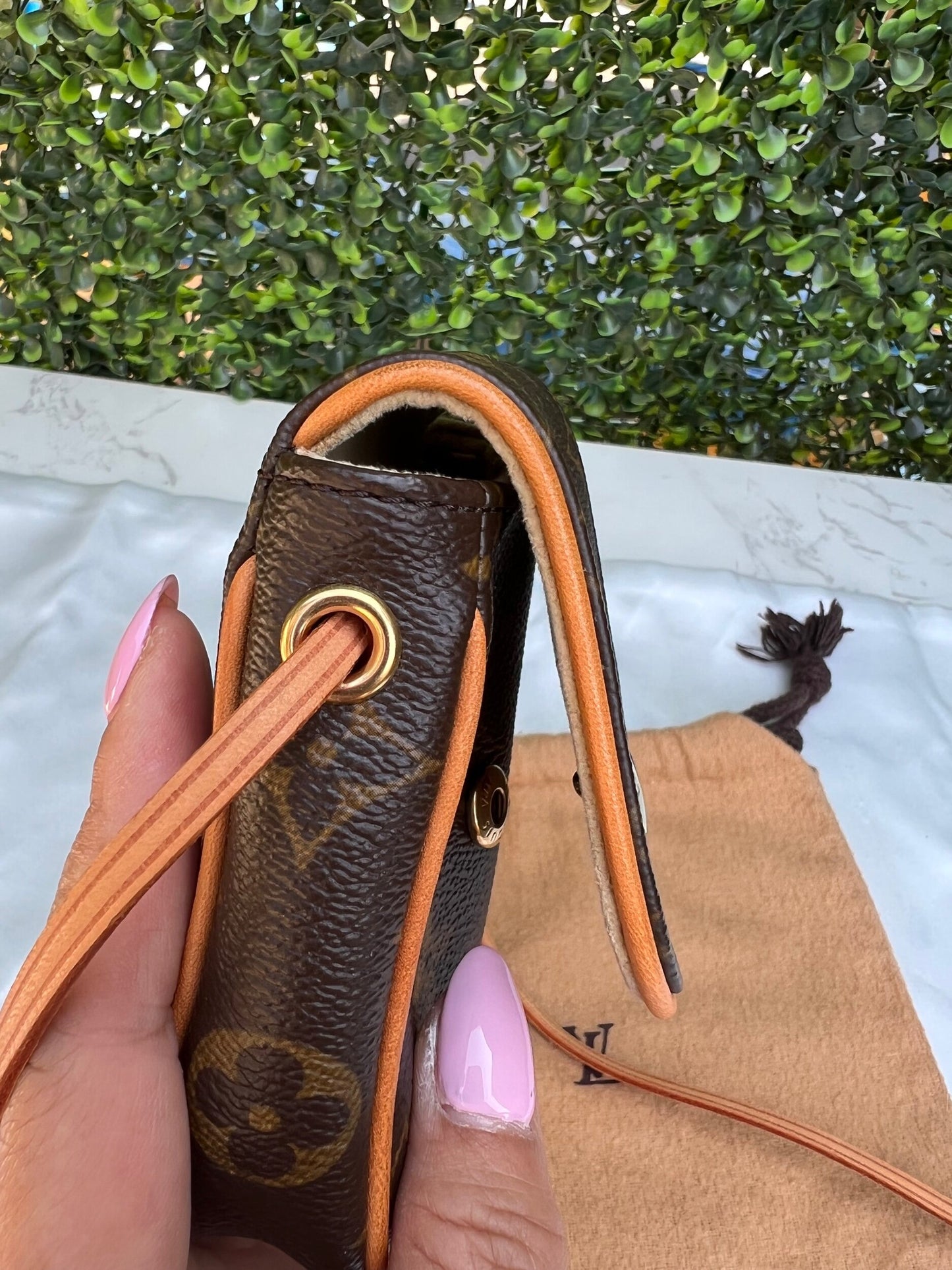 Authentic Preowned Louis Vuitton Monogram Canvas Cancun Pochette Bag.