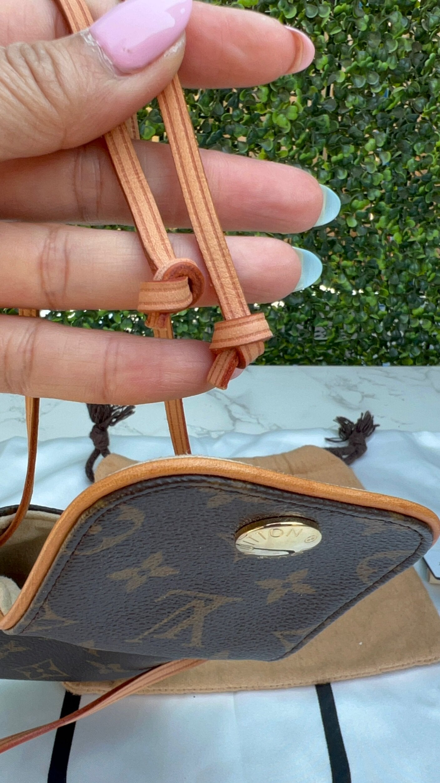 Authentic Preowned Louis Vuitton Monogram Canvas Cancun Pochette Bag.