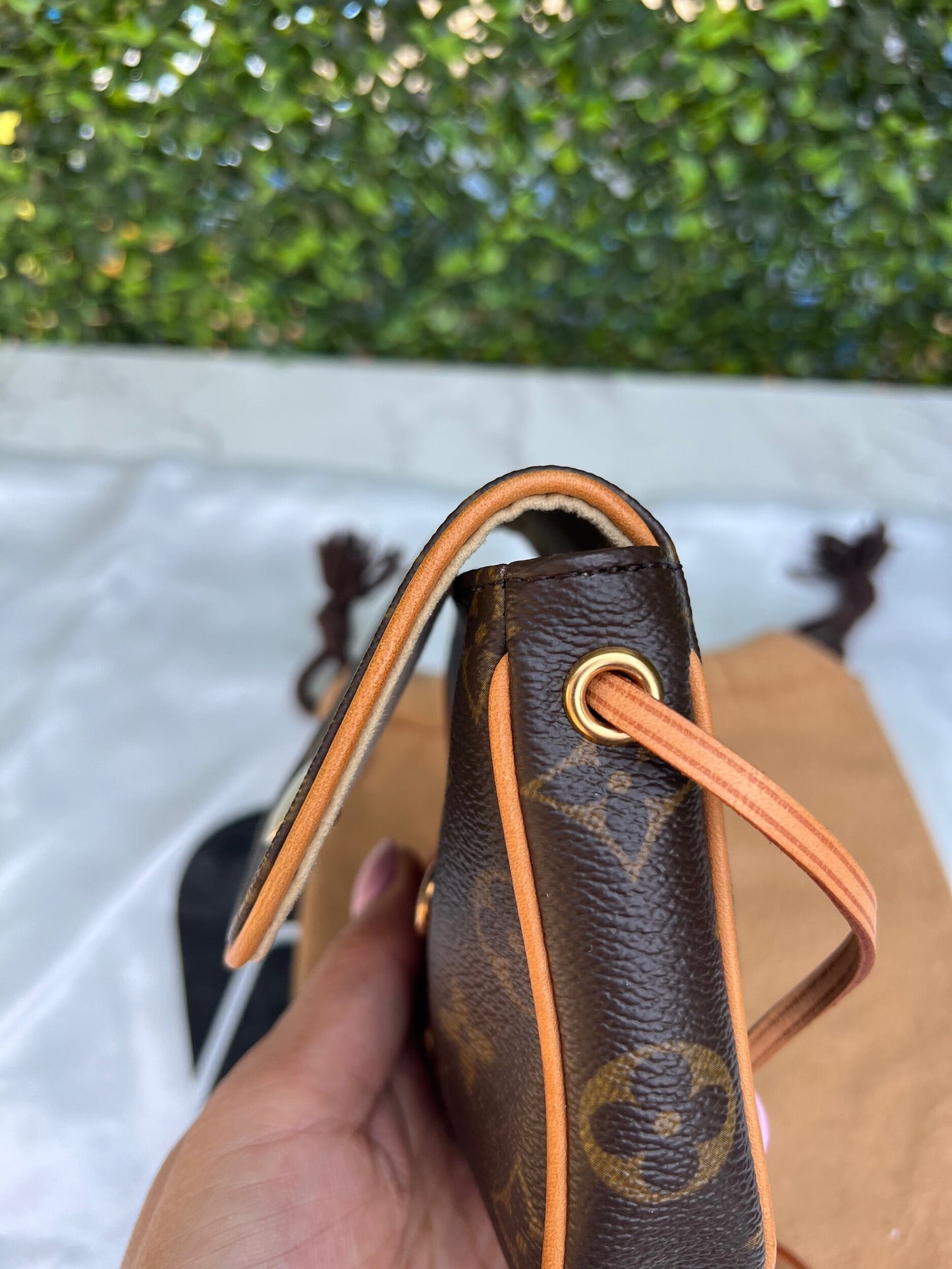 Authentic Preowned Louis Vuitton Monogram Canvas Cancun Pochette Bag.