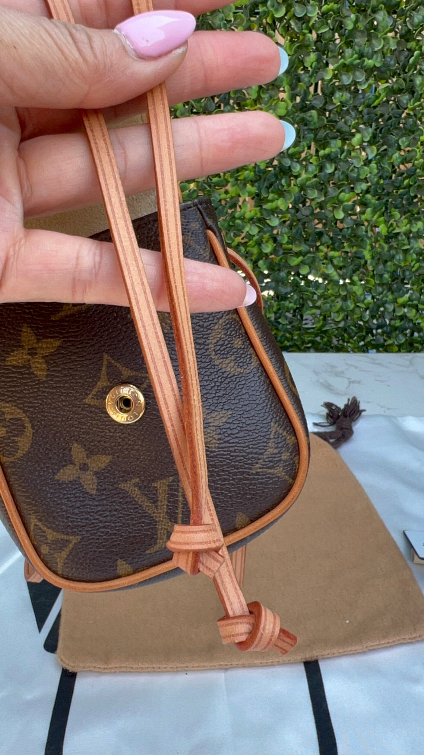 Authentic Preowned Louis Vuitton Monogram Canvas Cancun Pochette Bag.