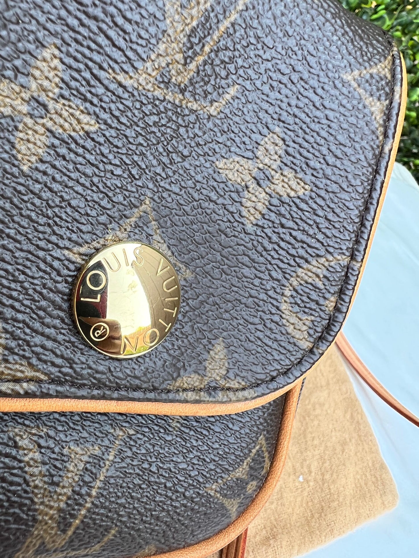 Authentic Preowned Louis Vuitton Monogram Canvas Cancun Pochette Bag.