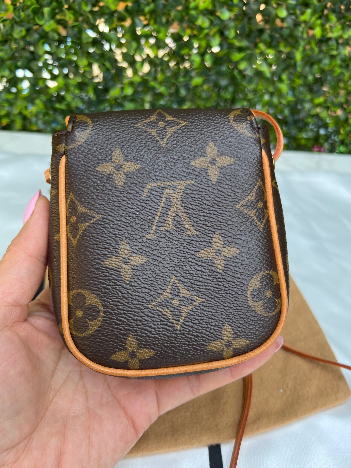 Authentic Preowned Louis Vuitton Monogram Canvas Cancun Pochette Bag.