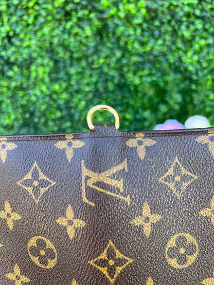Insolite Monogram Canvas Clutch/Wallet