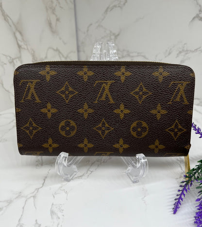 Zippy Wallet Monogram Canvas Brown