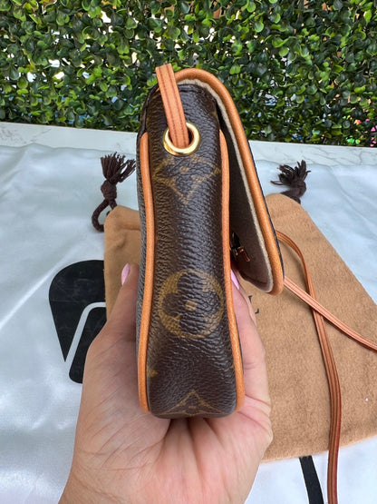 Authentic Preowned Louis Vuitton Monogram Canvas Cancun Pochette Bag.