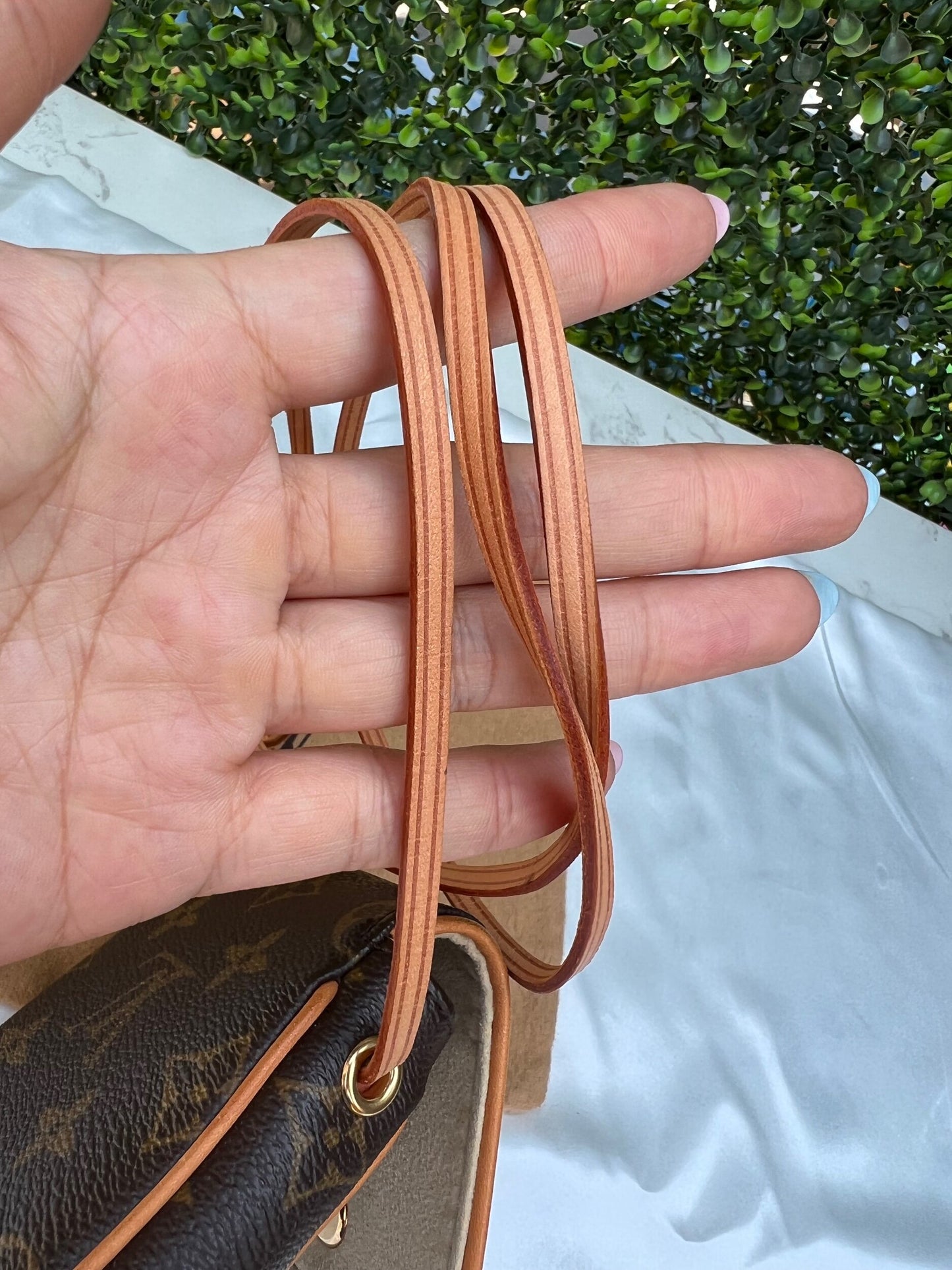 Authentic Preowned Louis Vuitton Monogram Canvas Cancun Pochette Bag.