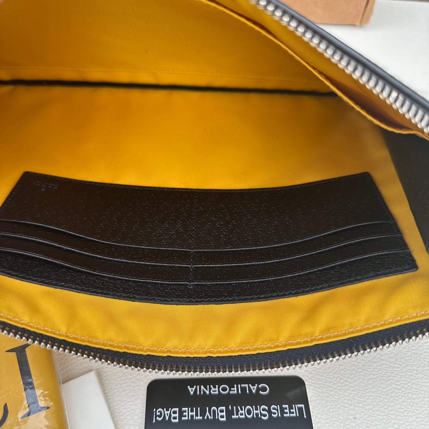 "Off The Grid" Econyl Wristlet Clutch Yellow